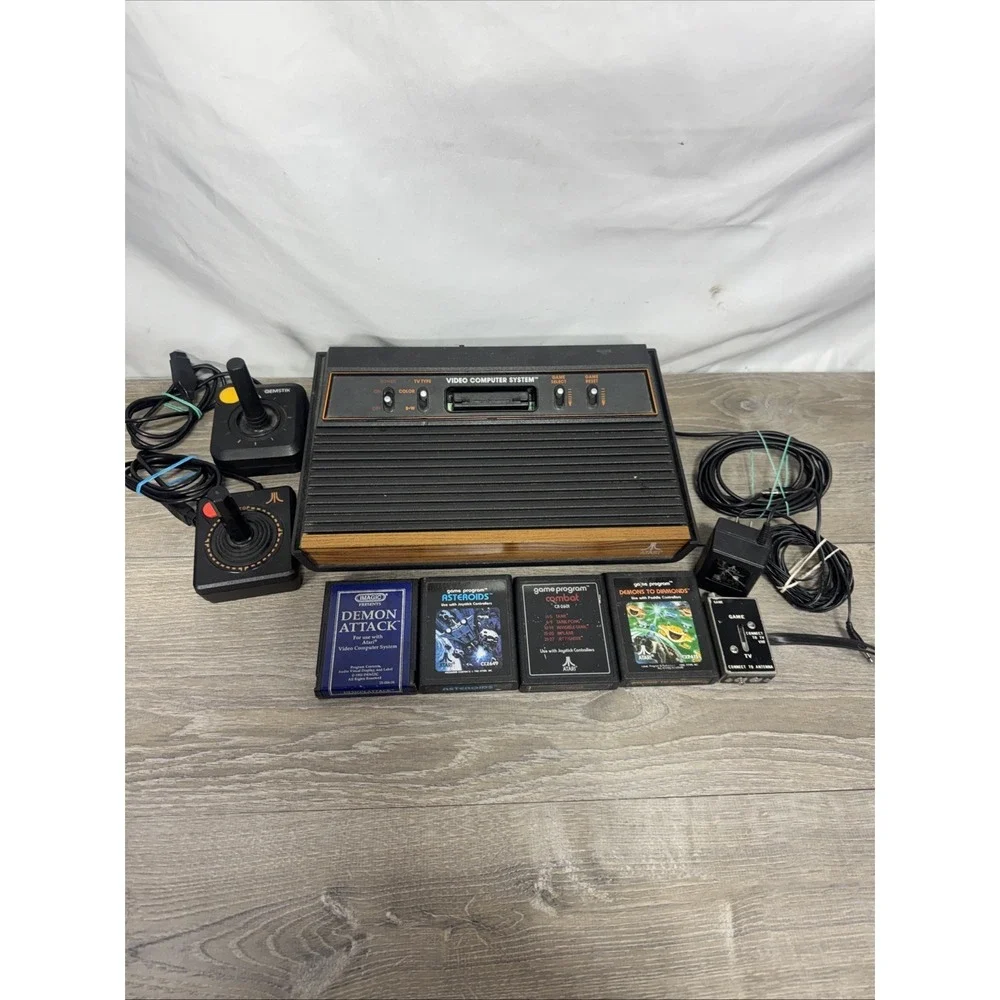 Atari 2600 4-Switch Woodgrain Console Bundle w/ 2 Joysticks, 4 Games Working